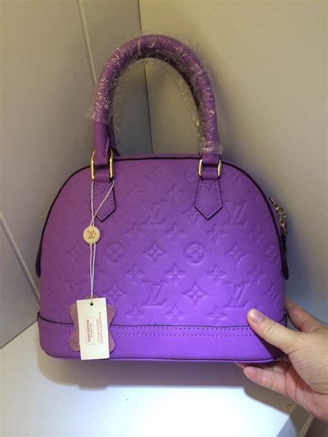 louis vuitton lavender bag.